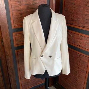 Off-white double breasted blazer.